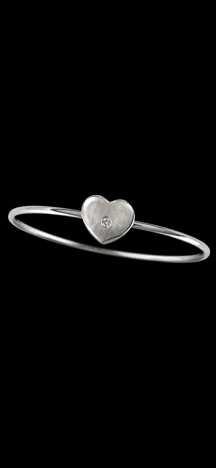 Tiffany & Co sterling silver heart bracelet with diamond in the middle